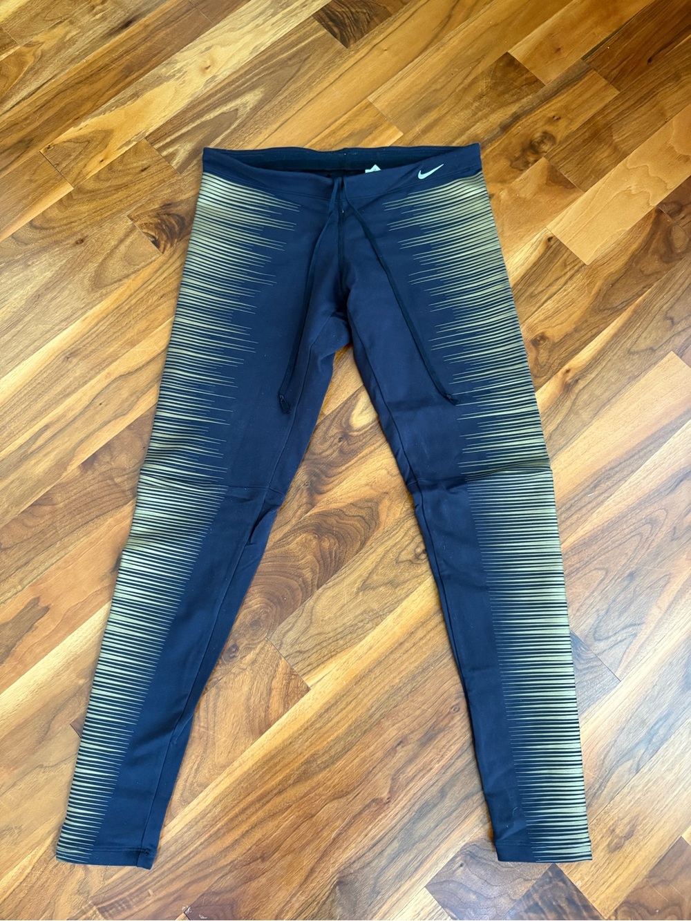 Nike Flash Black Leggings with Reflective Gold Stripe Fade, USED
